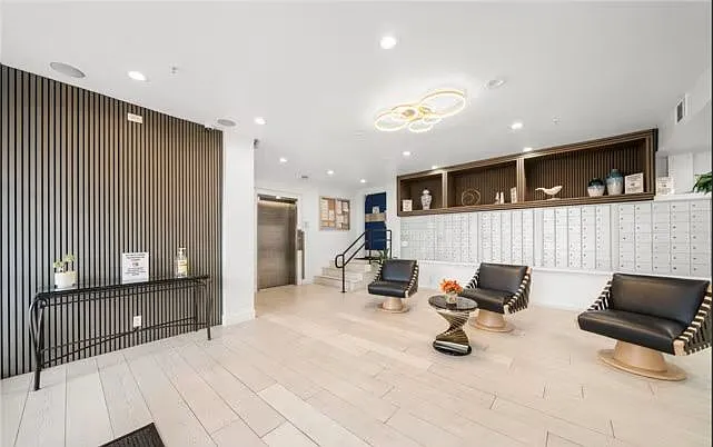 Lobby area with elevator and access to garage