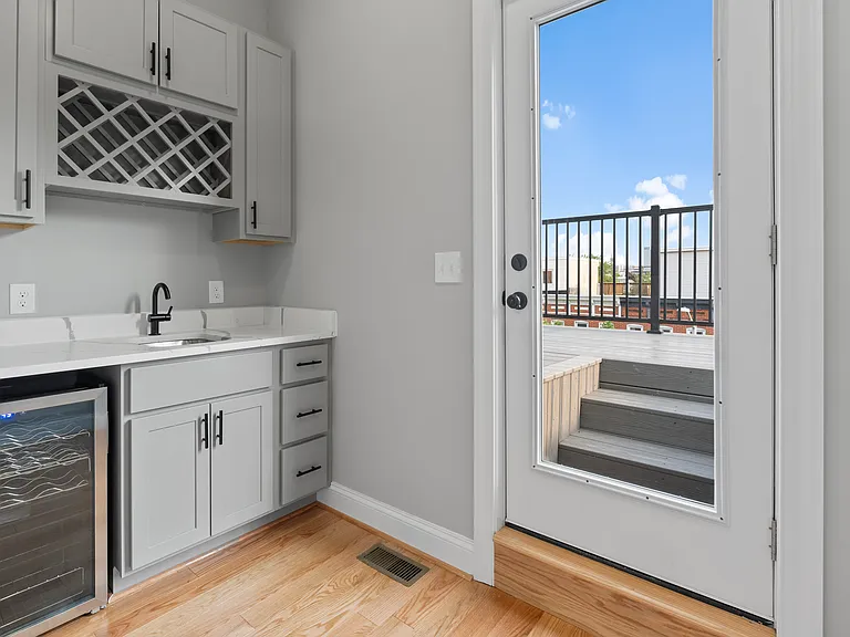 3rd Floor Wet Bar (1) with front balcony access