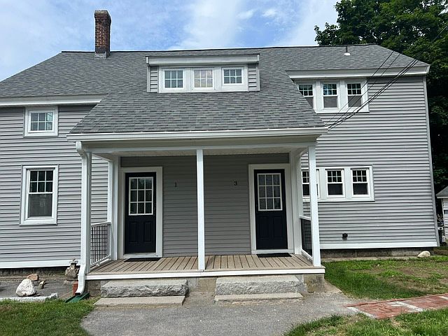 separate entrances for apartments. porch has recessed lighting and deadbolt combination lock