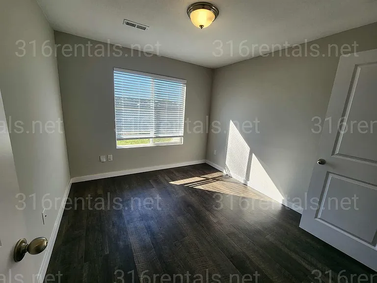 1813 E 69th Ct N — Photo 6