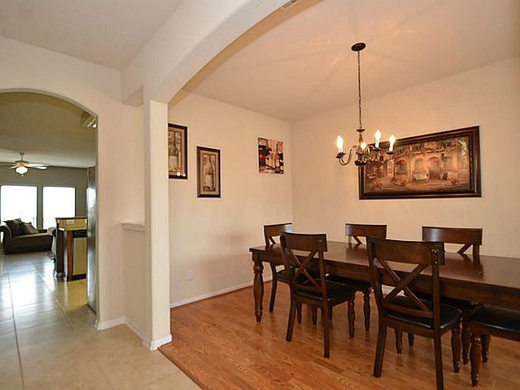 Enjoy family time around the table in this bright and welcoming dining room.