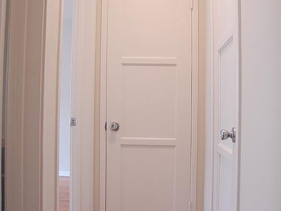 Hallway with two closets