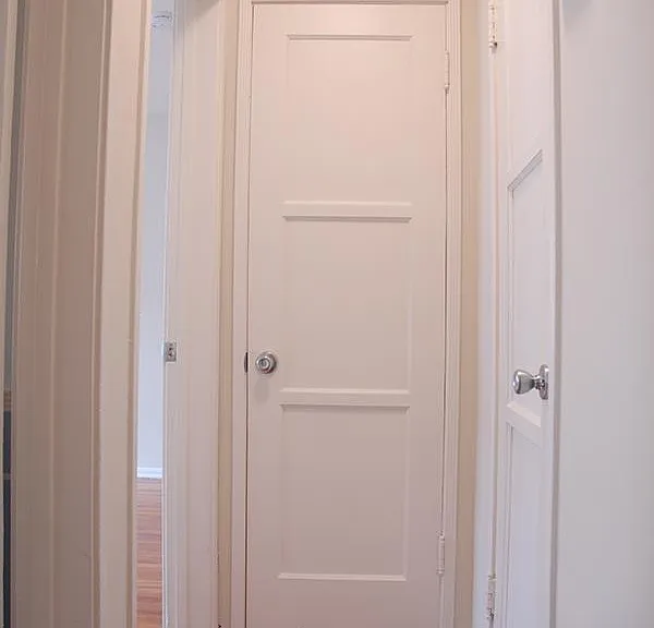 Hallway with two closets