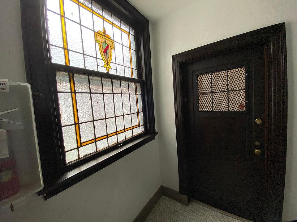 Stained glass and original detail throughout.