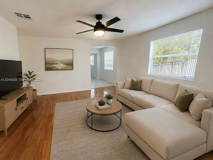 7720 Raleigh St — Photo 4
