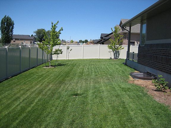 Fenced side yard.