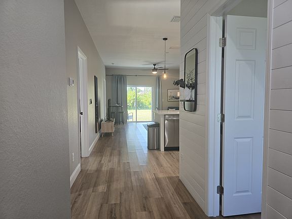 Entry with shiplap accent wall