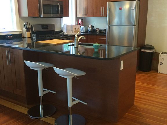 Kitchen counter with bar stools