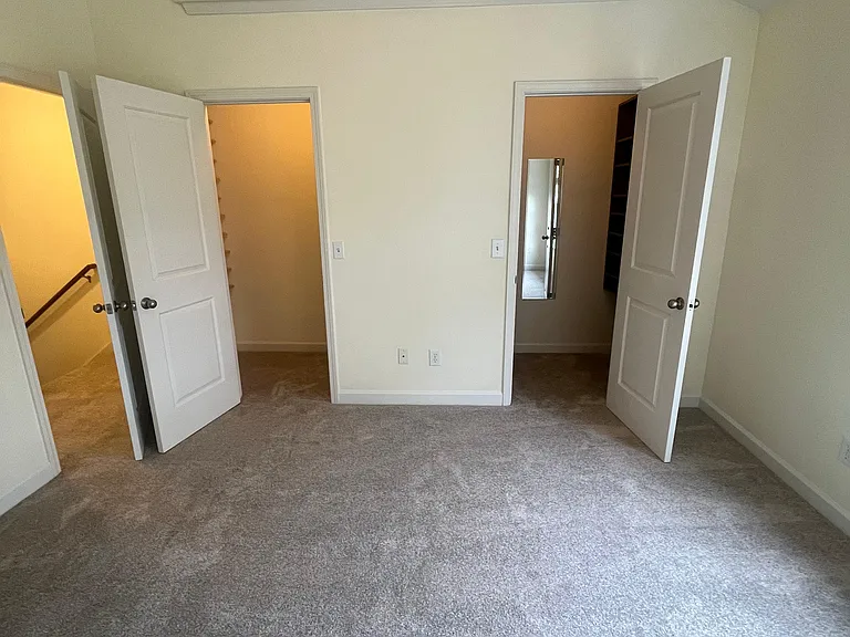 Dual closets in main bedroom