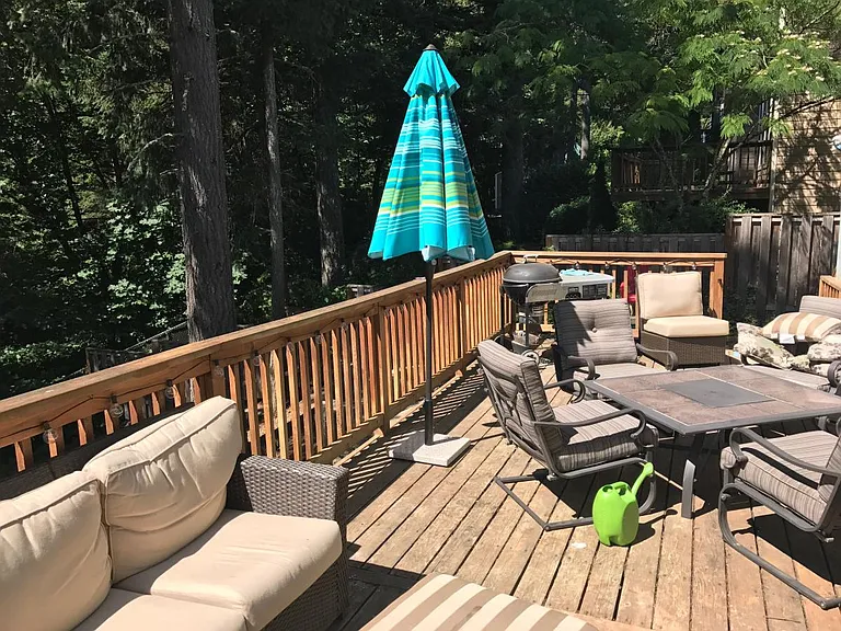 Terrific large deck with a fenced yard that backs to a greenway..