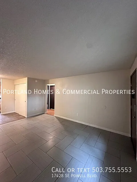 Charming 2-Bed Oasis with Modern Comforts on Powell Blvd. — Photo 4