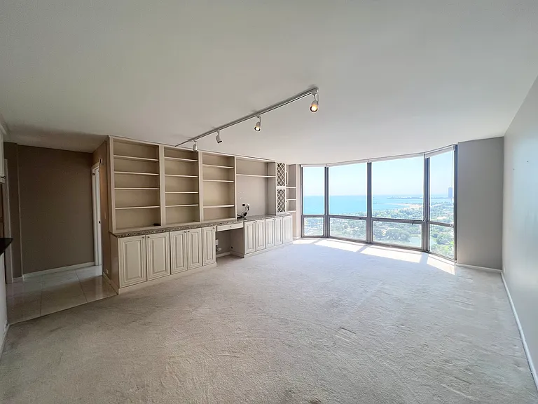 Spacious Living/Dining Room with unobstructed lake, park and city views