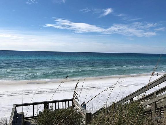 Private beach access with sitting area