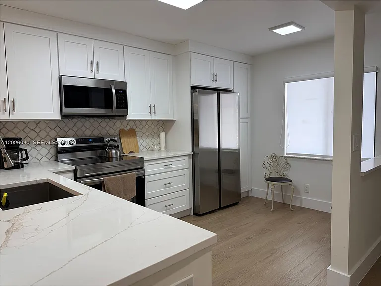7350 Kinghurst Dr #305 — Photo 19