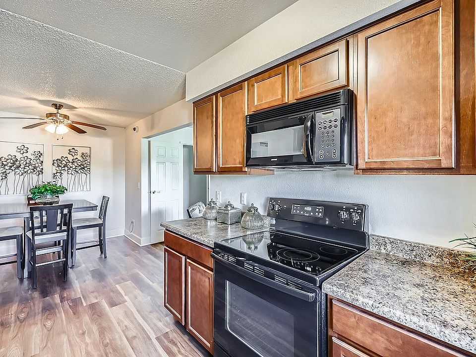 Experience modern living with this elegant kitchen and dining area, perfect for culinary delights and cozy meals.