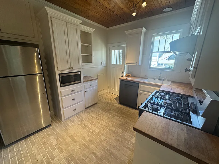 Kitchen showing the entrance from the driveway