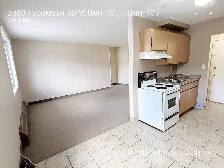 2880 Tecumseh Rd W #303 — Photo 9