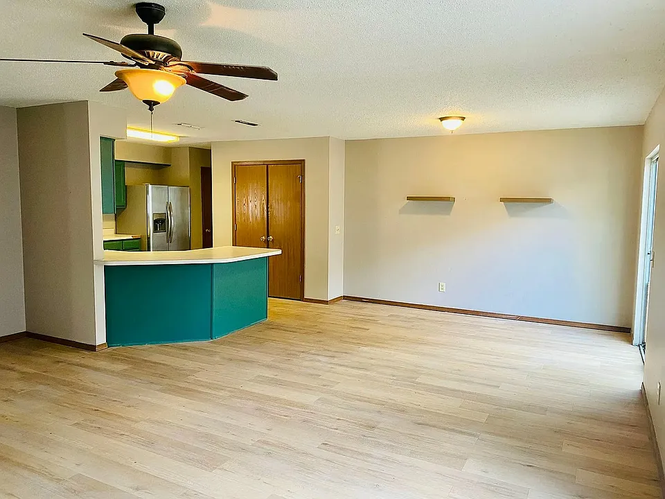 Open kitchen with stainless appliances