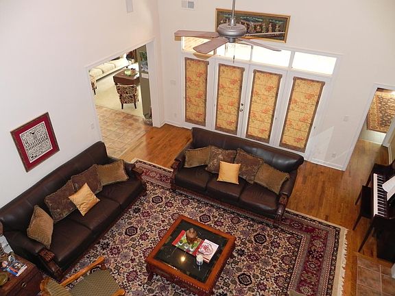 Elegant living room with two story ceilings