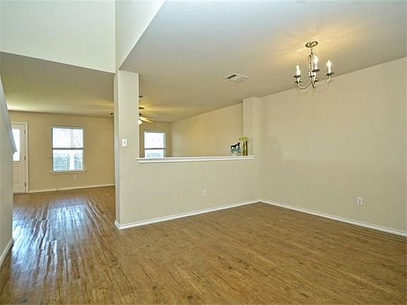 Entering the home, this laminate flooring is great for the formal dining area or flex room for kids or home office