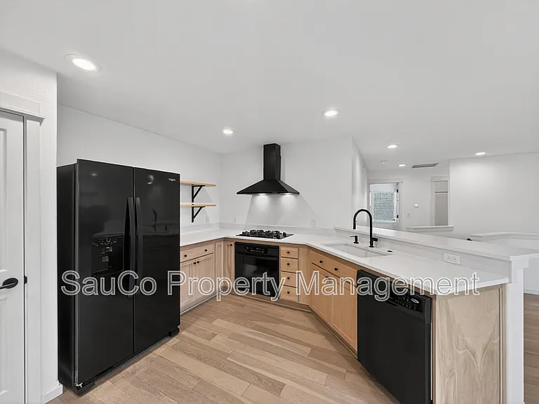 7399 NE Stonewater St — Photo 12