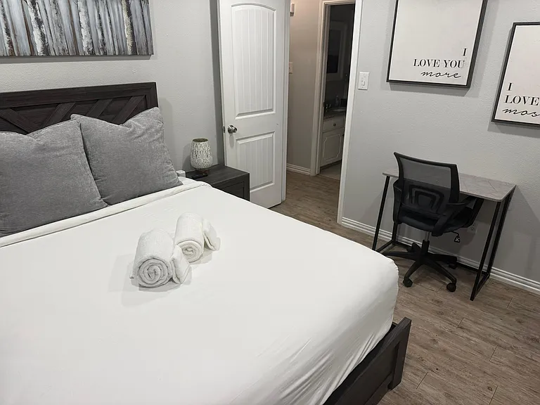 Comfortable bedroom with a private desk area