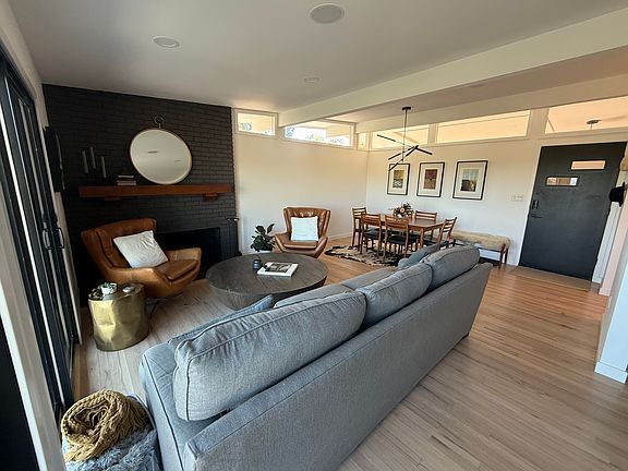 Open living and dining room - view of front door