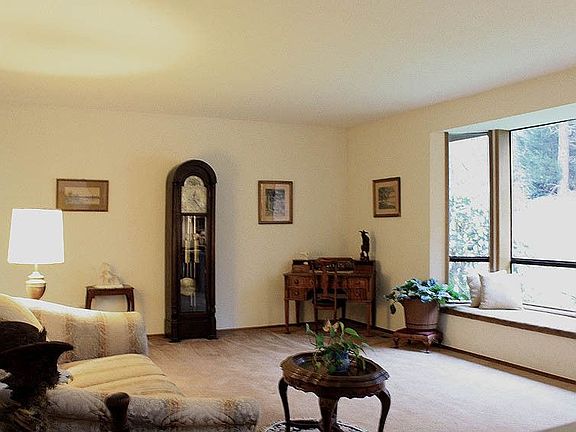 Formal living room with window seat