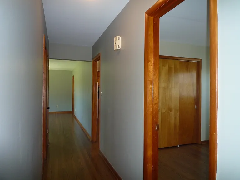 Hallway from LR to BRs. This from Master BR (on left) back to Living Room with two BR's on right across from hall bath