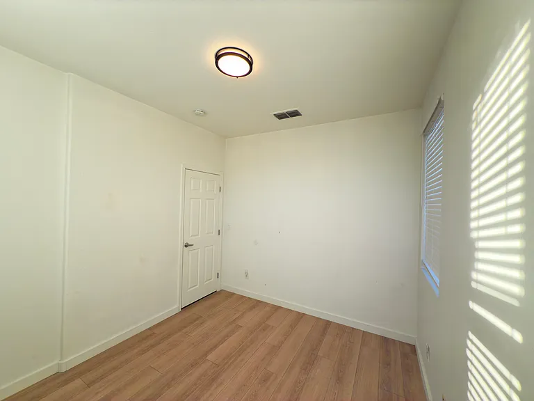 Room 1. Home Office or Bedroom (if one of the rooms could serve as an office or has a different use)