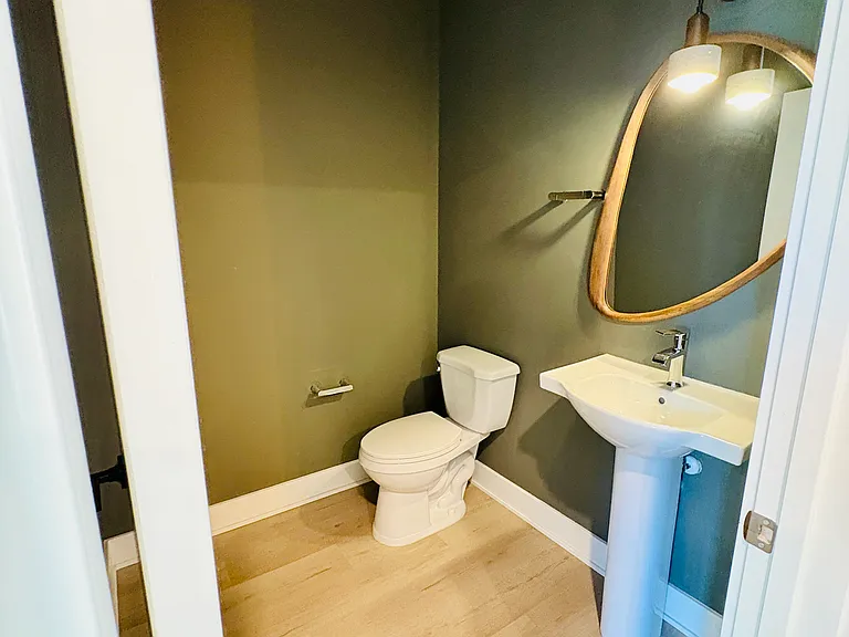 1/2 BATH BY KITCHEN/LIVING ROOM