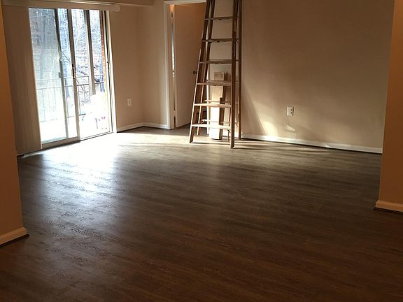 Living Room/ Door to Balcony