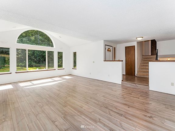 The living room has so much natural light!