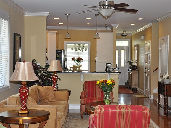 View from the Sunroom of the Living Room, Kitchen and Dining Room (