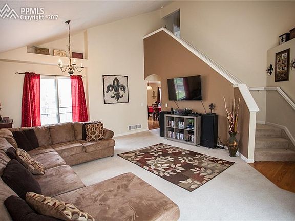 Open vaulted ceiling living room.