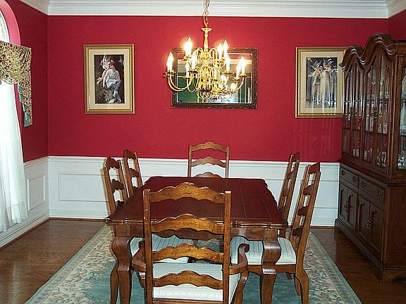 The formal dining room is just off the two story entry and has beautiful hardwood floors.