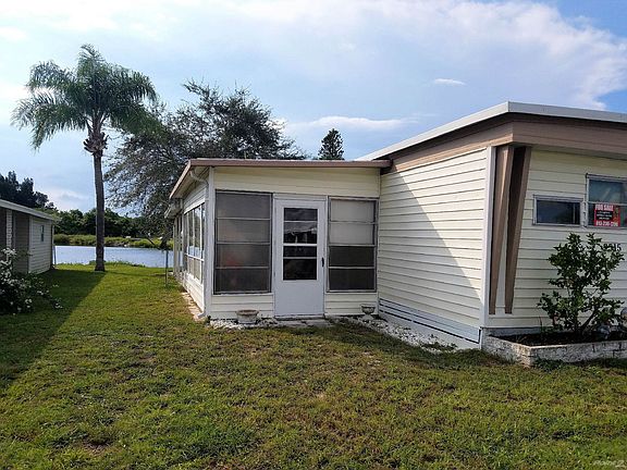 Side of home with Florida room