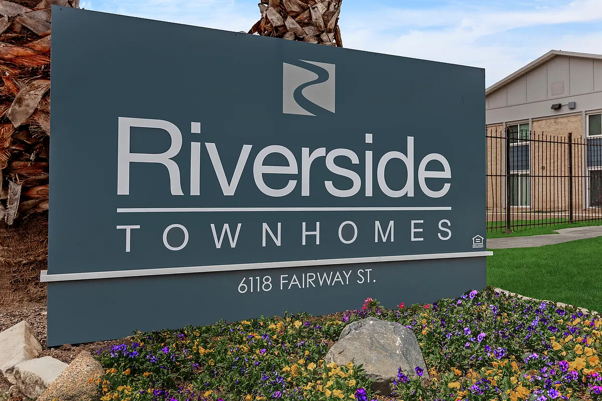 Property sign - Riverside Townhomes