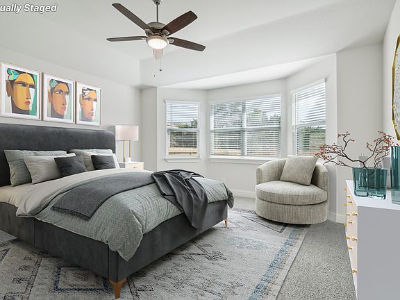 Virtually staged primary suite in the Sabine floorplan at a Meritage Homes community.