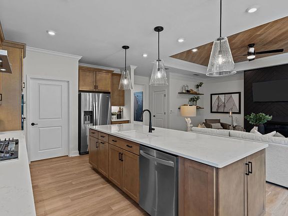 Large Kitchen Island with Decorative Lighting.