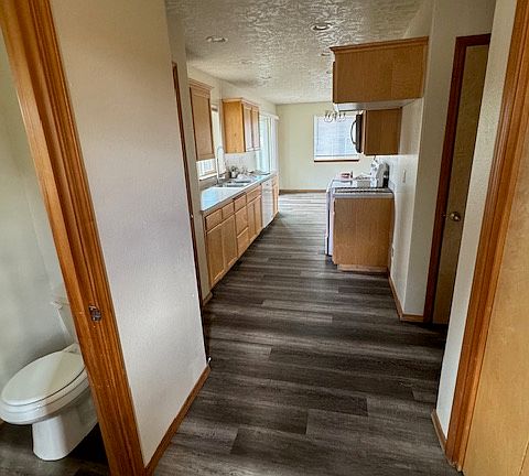 Large closet under stairwell.