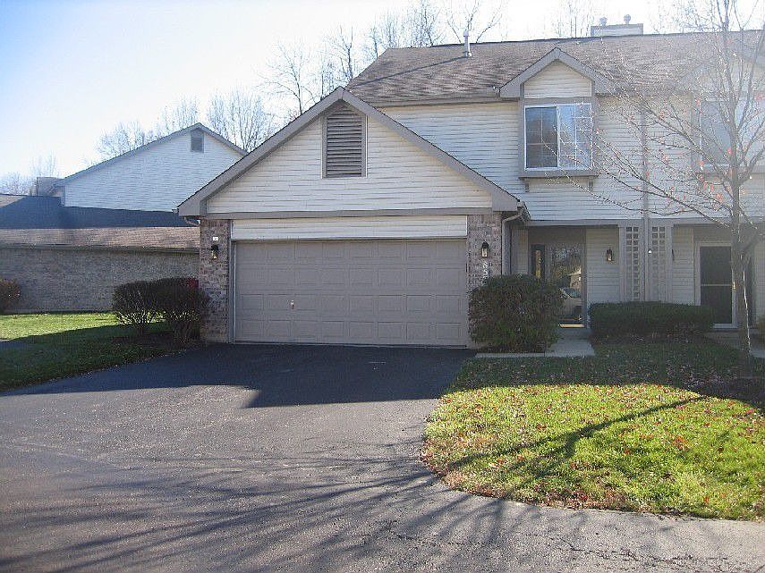 Corner unit with private drive and two car garage
