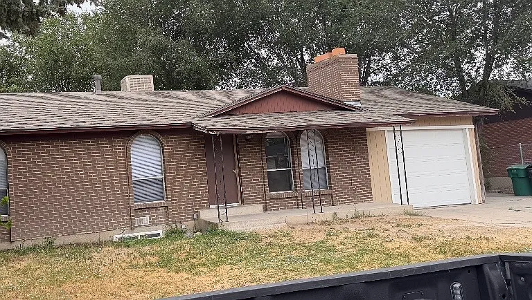 Front yard with new garage