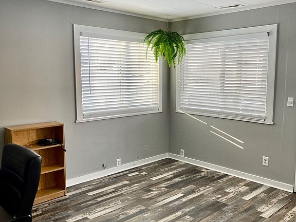 Another view of sunny living room