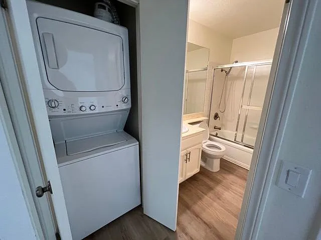 Laundry with stacked washer and dryer