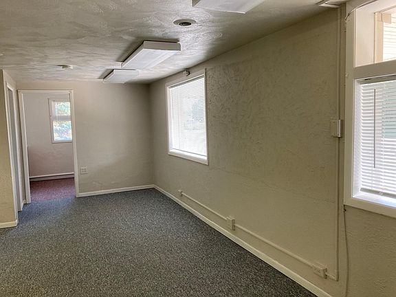 Large front rm with big windows