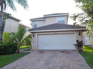 5209 Rising Comet Ln, Green Acres, FL 33463