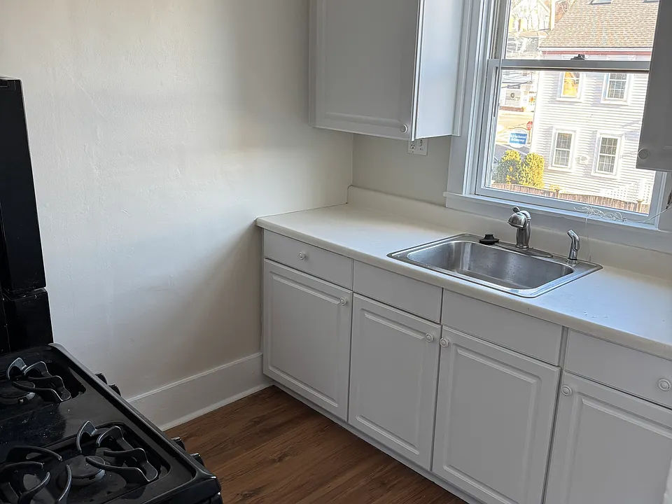 Refinished kitchen cabinets, fresh paint and upgraded stainless steel appliances.