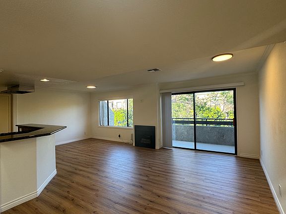 First Floor Living Area with Balcony Access