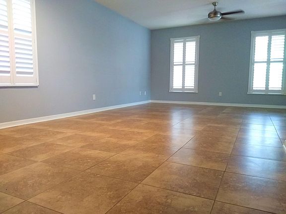 Grand formal livingroom. Ceiling fans in virtually every room in addition to multi-zone HVAC